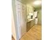 Kitchen featuring stainless dishwasher and in-unit washer and dryer at 7309 W Hampden Ave # 5202, Lakewood, CO 80227