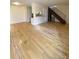 Bright living room featuring refinished hardwood floors and ample natural light at 7309 W Hampden Ave # 5202, Lakewood, CO 80227