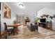 Spacious open-concept living room with natural light and access to the kitchen at 871 S Joplin Cir, Aurora, CO 80017