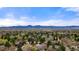 Scenic aerial view of a lush, green neighborhood with mountain views at 4788 Briar Ridge Trl, Boulder, CO 80301