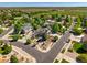 An aerial view shows a green home nestled in a landscaped community at 21395 E Greenwood Pl, Aurora, CO 80013