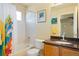 Bathroom featuring bathtub, shower and single vanity at 21395 E Greenwood Pl, Aurora, CO 80013