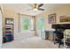 Bedroom featuring neutral walls and carpet, complemented by abundant natural light at 21395 E Greenwood Pl, Aurora, CO 80013