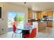 Bright kitchen with breakfast nook area, stainless steel appliances, and deck access at 21395 E Greenwood Pl, Aurora, CO 80013