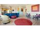 Open-concept floor plan with kitchen, living room, and dining area at 21395 E Greenwood Pl, Aurora, CO 80013