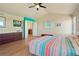 Bright, open main bedroom featuring vaulted ceilings and an ensuite bathroom at 21395 E Greenwood Pl, Aurora, CO 80013
