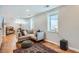 Finished basement featuring windows, a large rug, and recessed lighting at 2252 S Lafayette St, Denver, CO 80210
