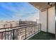 A balcony view features city skyline and blue sky at 1827 N Grant St # 1104, Denver, CO 80203