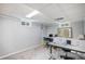 Finished basement with carpeted floors, natural light, and neutral paint at 92 Helena Cir, Littleton, CO 80124