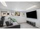 Finished basement featuring a seating area and entertainment space at 92 Helena Cir, Littleton, CO 80124