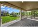Relax on the back porch overlooking the lush lawn and scenic views at 19782 W 59Th Ave, Golden, CO 80403