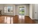 Bright living room with a sliding glass door that leads to the backyard at 19782 W 59Th Ave, Golden, CO 80403