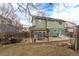 Two-story home featuring backyard patio with pergola and lush landscaping at 12222 N Ivanhoe Cir, Brighton, CO 80602