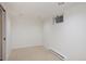 Finished basement with carpet flooring, a small window and fresh paint at 1615 Locust St, Denver, CO 80220