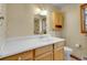 Bathroom with vanity, mirror, and toilet at 6094 Pyrenees Trl, Golden, CO 80403