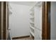 Large walk-in closet with shelving and hanging rods at 2103 Ranch Dr, Westminster, CO 80234