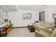 Finished basement Gathering room featuring comfortable seating and stylish decor at 2103 Ranch Dr, Westminster, CO 80234