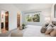 Bright bedroom with a queen-size bed and ample closet space at 2103 Ranch Dr, Westminster, CO 80234