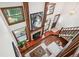 Open living room with hardwood floors, fireplace, and loft at 2103 Ranch Dr, Westminster, CO 80234