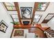 High-ceilinged living area with fireplace, hardwood floors, and loft at 2103 Ranch Dr, Westminster, CO 80234