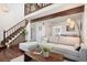Light and airy living room with hardwood floors and loft area at 2103 Ranch Dr, Westminster, CO 80234