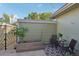 Private patio with seating area, garden, and string lights at 2103 Ranch Dr, Westminster, CO 80234
