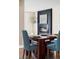 Stylish dining room featuring modern decor, including a fireplace and hardwood flooring at 2941 Oneida St, Denver, CO 80207