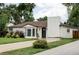 Attractive one-story home with brick details, updated windows, and a well-maintained yard at 2941 Oneida St, Denver, CO 80207