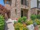 Beautiful two-story home with a stone facade and inviting front entrance with garden at 2741 Java Ct, Denver, CO 80211