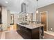 Spacious kitchen with a large center island, modern lighting, and open layout at 2741 Java Ct, Denver, CO 80211