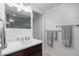 Bathroom featuring sleek vanity with marble countertop, and chrome hardware fixtures at 7696 S Hudson Way, Centennial, CO 80122