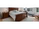 Spacious main bedroom suite with dark wood accents, natural light, and decorative details throughout at 7696 S Hudson Way, Centennial, CO 80122