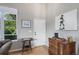 Bright entryway featuring hardwood floors and stylish decor at 7696 S Hudson Way, Centennial, CO 80122