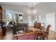 Inviting living room with hardwood floors and large window at 7696 S Hudson Way, Centennial, CO 80122