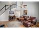 Comfortable living room with hardwood floors and a staircase at 7696 S Hudson Way, Centennial, CO 80122