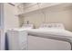 Laundry room featuring modern washer and dryer units at 2215 E Geddes Ave # P08, Littleton, CO 80122