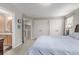 Bright bedroom with a plush bed, TV, and en-suite bathroom at 1371 W 133Rd Way, Denver, CO 80234