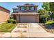 Charming two-story home features a two-car garage and well-maintained front yard at 1371 W 133Rd Way, Denver, CO 80234