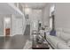 Spacious living room with high ceilings, stairs, and natural light at 1371 W 133Rd Way, Denver, CO 80234