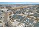 Beautiful aerial view of a neighborhood featuring modern homes and well-maintained streets with partial snow cover at 4981 Liverpool St, Denver, CO 80249