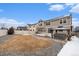 Spacious backyard featuring a patio, a hot tub under a gazebo, and a seating area at 4981 Liverpool St, Denver, CO 80249