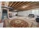 Unfinished basement with exposed ceiling and potential for customization at 4981 Liverpool St, Denver, CO 80249