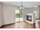 Dining area featuring tile fireplace and sliding glass door to deck at 11029 Grouse Ct, Parker, CO 80134