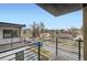 Enjoy the neighborhood views from this condo's balcony with black metal railing at 2323 S High St, Denver, CO 80210