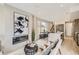 Open living space with a fireplace, modern decor, and open access to the kitchen create an inviting atmosphere at 2323 S High St, Denver, CO 80210
