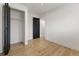 Bedroom with closet space and modern black paneled doors at 18396 E Mexico Pl, Aurora, CO 80017