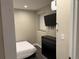 Bedroom with white bedding, dark dresser and window at 10010 Columbine Ct, Thornton, CO 80229