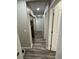 Hallway featuring hardwood floors at 10010 Columbine Ct, Thornton, CO 80229