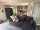 View of living room leading to kitchen with dining seating at 10010 Columbine Ct, Thornton, CO 80229