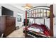 Bedroom with bunk beds, a dresser, and a ceiling fan at 9484 E 108Th Ave, Commerce City, CO 80640